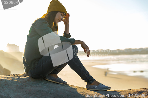 Image of Sitting over the cliff