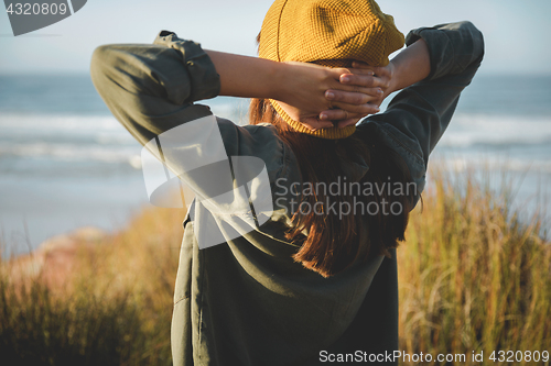 Image of Yellow cap women