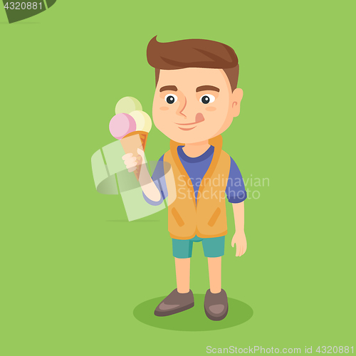 Image of Little caucasian boy holding an ice cream cone.