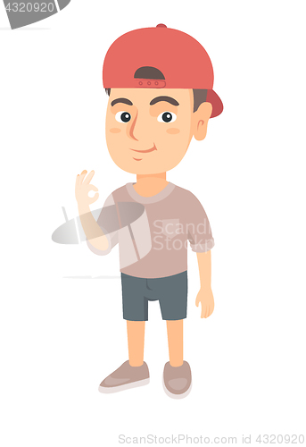Image of Caucasian little boy showing ok sign.