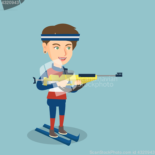 Image of Young caucasian biathlon runner aiming at target.