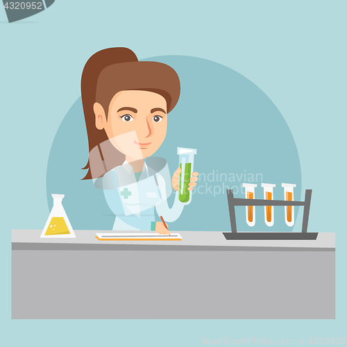 Image of Young caucasian laboratory assistant at work.