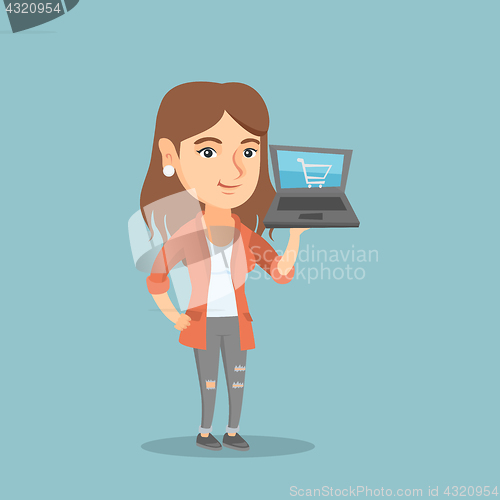 Image of Woman holding a laptop with trolley on a screen.