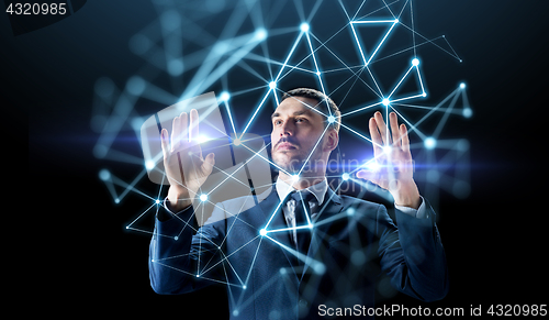 Image of businessman with virtual low poly projection