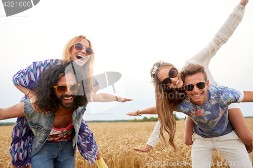 Image of happy hippie friends having fun on cereal field