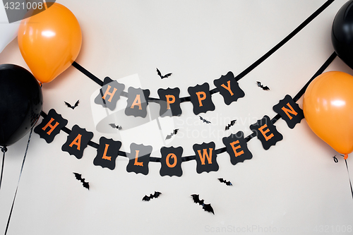 Image of happy halloween party garland with air balloons