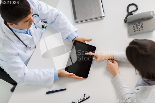 Image of doctor and young woman meeting at hospital