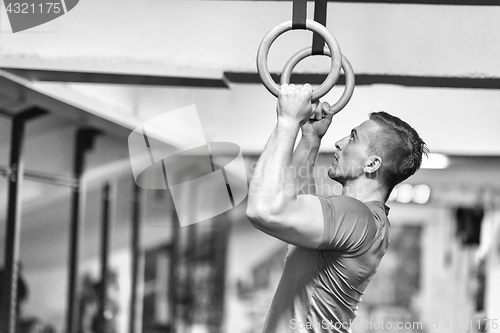 Image of man doing dipping exercise