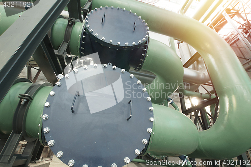 Image of Industrial zone, Steel pipelines, valves and ladders