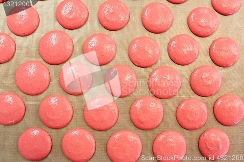 Image of macaron batter or meringue cream on baking paper