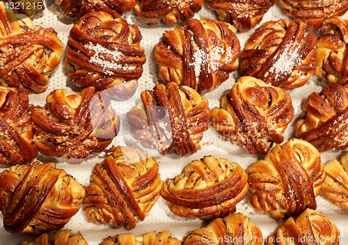 Image of buns or pies at bakery