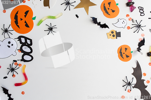 Image of halloween party paper decorations and sweets