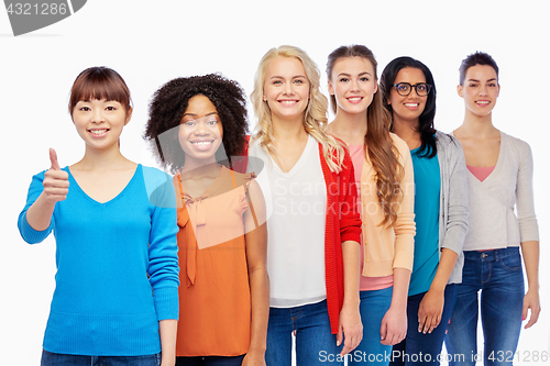 Image of international group of women showing thumbs up