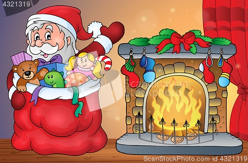 Image of Santa Claus with gifts by fireplace