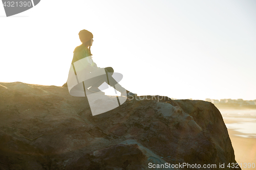 Image of Sitting over the cliff