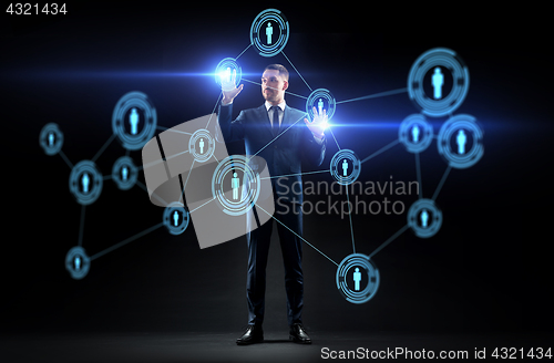 Image of businessman with virtual network contacts