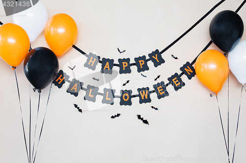 Image of happy halloween party garland with air balloons