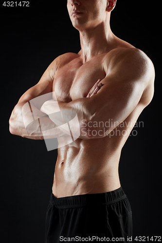 Image of close up of man or bodybuilder with bare torso