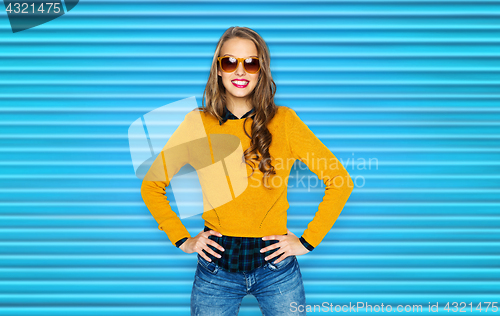 Image of happy young woman or teen girl in casual clothes