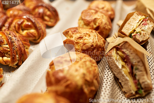 Image of close up of bread, buns, pies and sandwiches