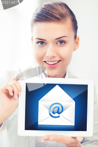 Image of businesswoman holding tablet pc with email sign