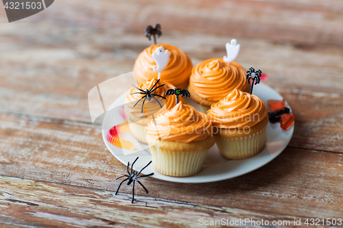 Image of halloween party cupcakes or muffins on table