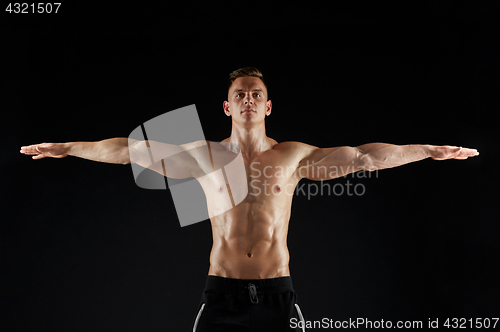 Image of young man or bodybuilder with bare torso