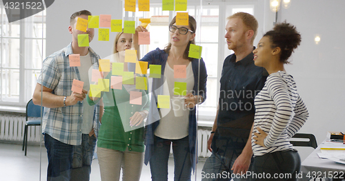 Image of Colleagues working together in modern office