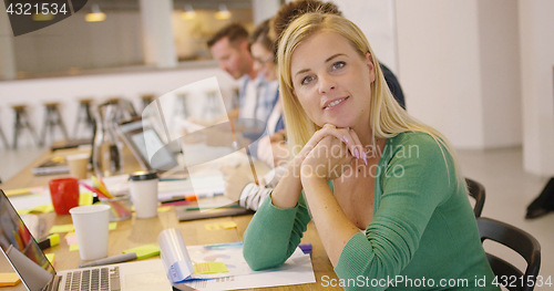 Image of Smiling employee in office