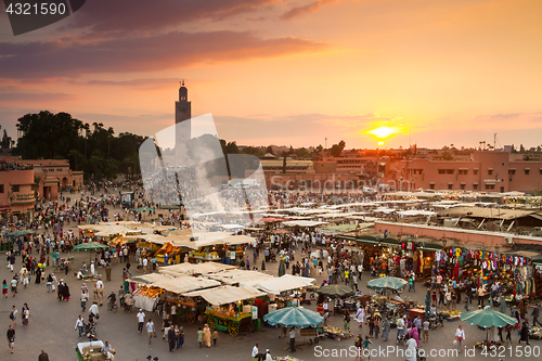 Image of Jamaa el Fna market square in sunset, Marrakesh, Morocco, north Africa.