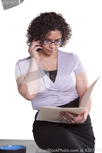 Image of Businesswoman at Her Desk Working