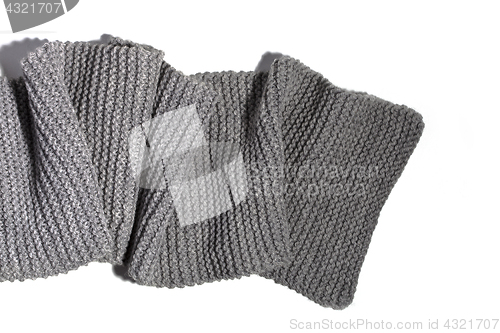 Image of knitted grey scarf isolated on white background