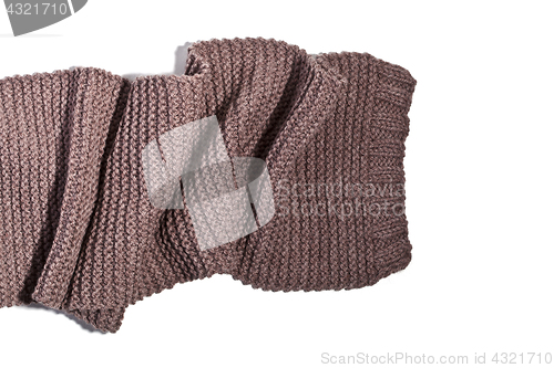 Image of knitted brown scarf isolated on white background