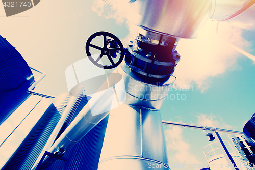 Image of Industrial zone, Steel pipelines in blue tones  