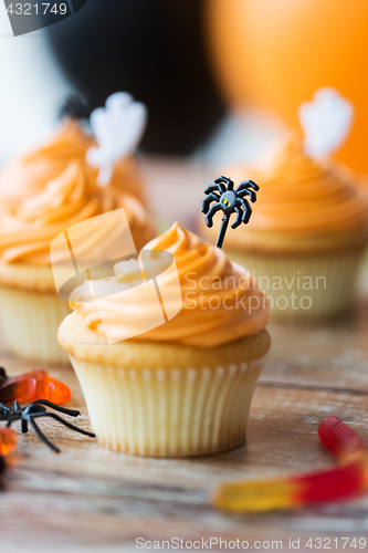 Image of halloween party cupcakes or muffins on table