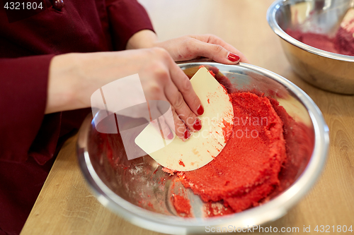 Image of chef making macaron batter at confectionery