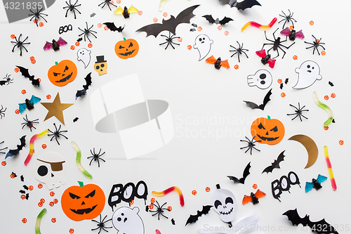 Image of halloween party paper decorations and sweets