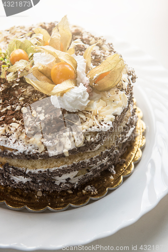 Image of cake with walnuts and physalis