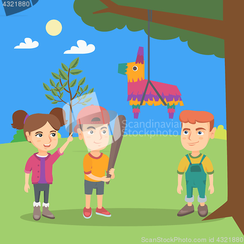 Image of Caucasian boy breaking pinata with a baseball bat.