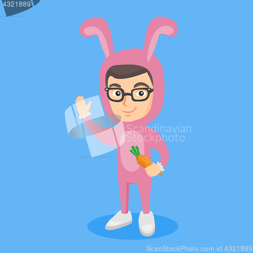 Image of Little caucasian boy wearing a rabbit costume.