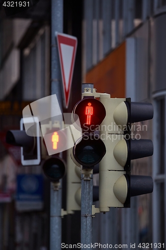 Image of Red traffic light in urban street