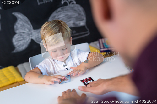 Image of Cute little toddler boy at child therapy session.