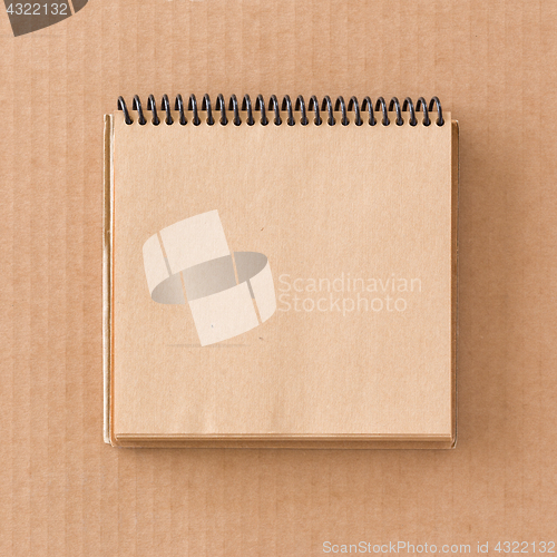 Image of Notepad on cardboard