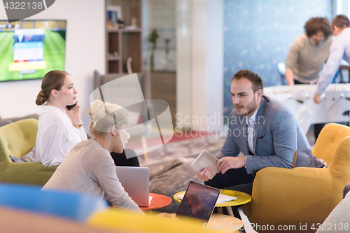 Image of Startup Business Team At A Meeting at modern office building