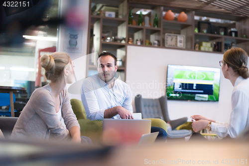 Image of Startup Business Team At A Meeting at modern office building