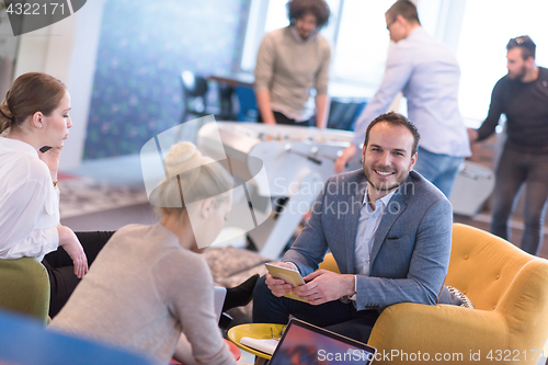 Image of Startup Business Team At A Meeting at modern office building