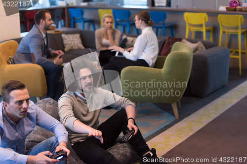 Image of startup Office Workers Playing computer games