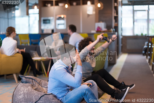 Image of startup Office Workers Playing computer games