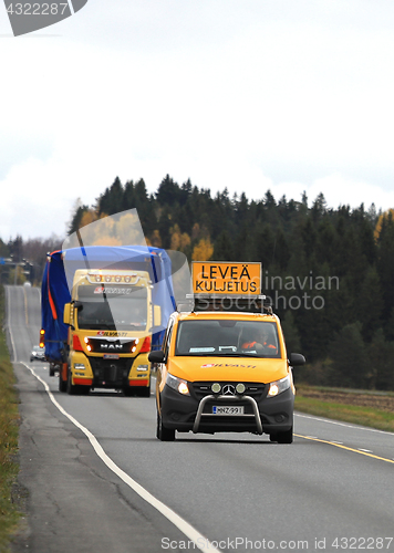 Image of Wide Load Truck Transport Led by Pilot Vehicle