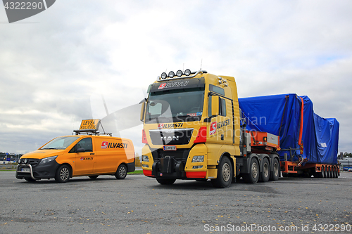 Image of Wide Load Transport with Pilot Vehicle Parked